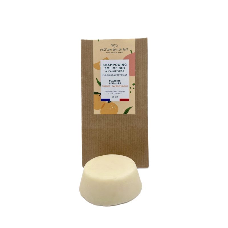 Shampooing solide bio "Plaisirs acidulés" à l'Aloe Véra, fragrance orange et pamplemousse.  Purifiant et fortifiant.  Formule 100% naturelle, vegan et zéro déchet.